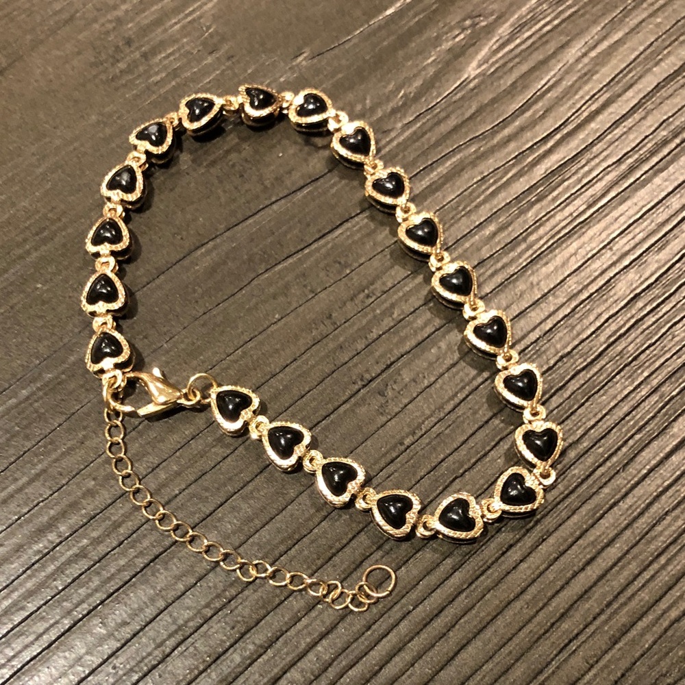 Elegant Black and Gold Heart Bracelet